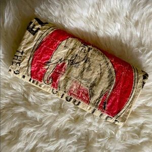 Unique upcycled elephant clutch